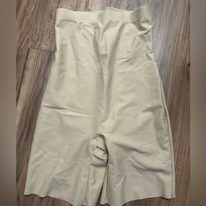 Skims high waisted mid thigh short